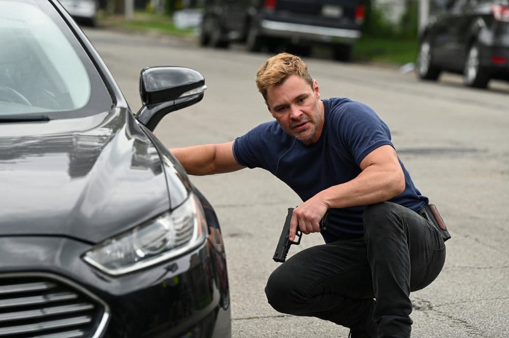 Patrick John Flueger as Officer Adam Ruzek in Chicago PD.