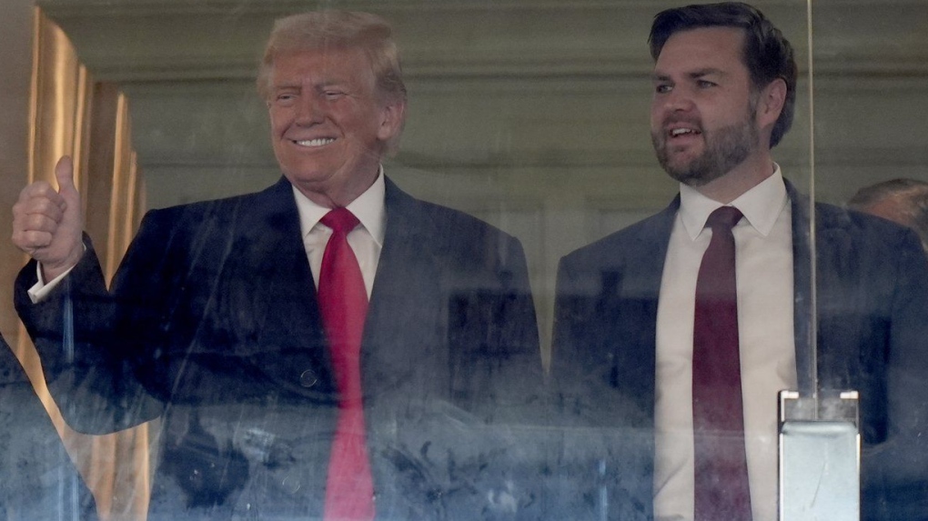 U.S. President-elect Donald Trump, left, and Vice President-elect JD Vance attend the NCAA college football game between Army and Navy at Northwest Stadium in Landover, Md., Saturday, Dec. 14, 2024. (Stephanie Scarbrough/AP Photo)